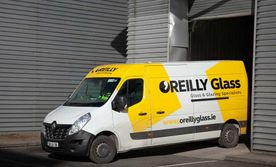 O Reilly Glass Van outside a warehouse